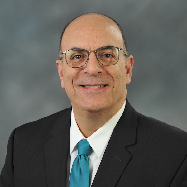 a studio profile picture of Jerry Rashid